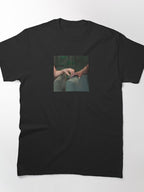 Ariana Holding Cynthias Nail Shirt | Pop Culture Fan Moment Tee